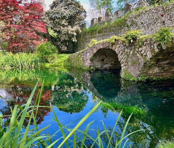 A stone bridge at the Giardino di Ninfa (Ninfa Gardens) in Lazio.