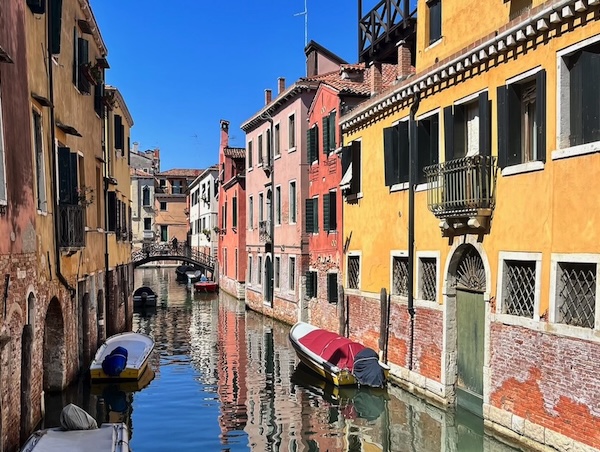 Quiet canal in Venice, Veneto, with historic buildings lining the water